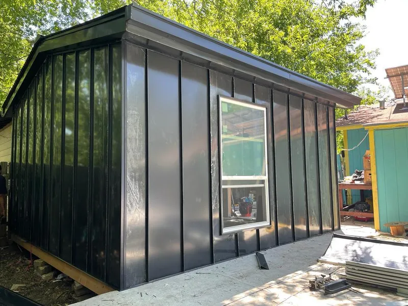 Black standing seam metal wall panels for Metal Roof Installation in Jacinto City