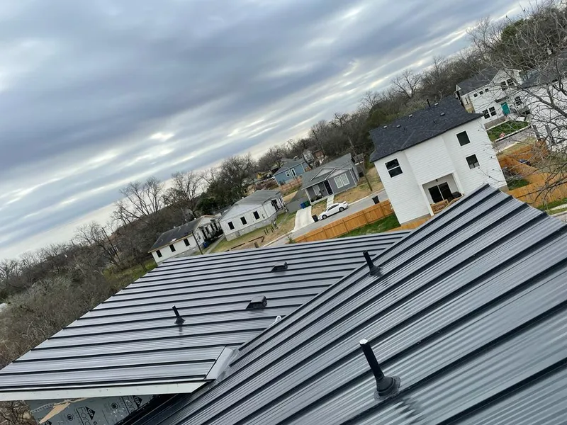 Standing seam metal roof panels with vents for Skylight Repair in Jacinto City